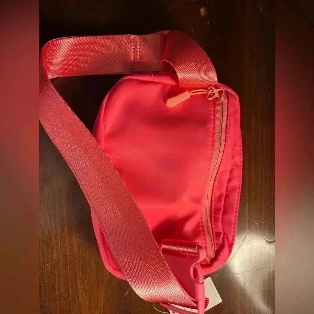 Francesca’s Neon Coral Cross Fanny NWT - Picture 5 of 6